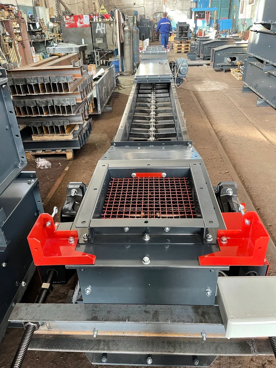 Custom machine frame with red cross members