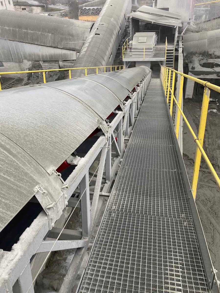 Covered conveyor with an access walkway